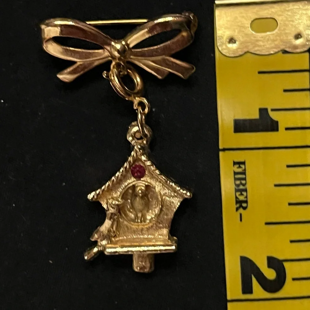 Vintage Gold Tone Bow and Birdhouse Brooch with Red Rhinestone Pendant